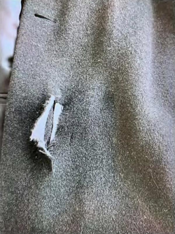 A tear in a Secret Service agent's coat.