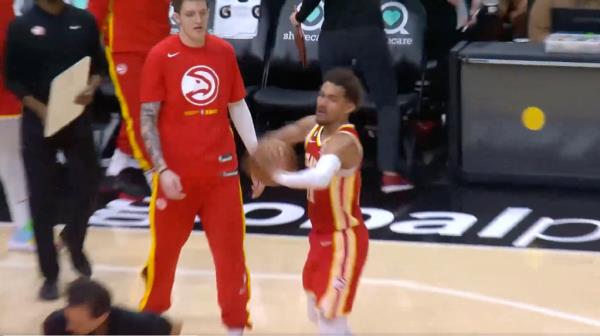 Trae Young hurls the ball towards referee Scott Wall during the Haws' win over the Pacers on March 25.