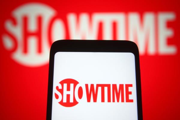 In this photo illustration, Showtime of a US television network is seen on a smartphone and a pc screen.