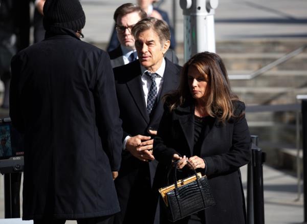 Dr. Mehmet Oz at the funeral of financier Thomas H. Lee.