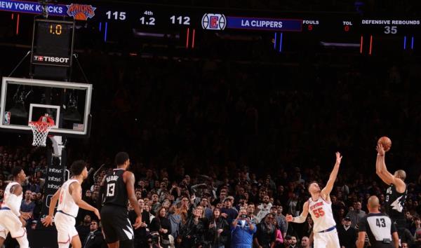 Clippers' Nicolas Batum (right) hits the game-tying 3-pointer at the end of regulation in the Knicks' overtime loss.