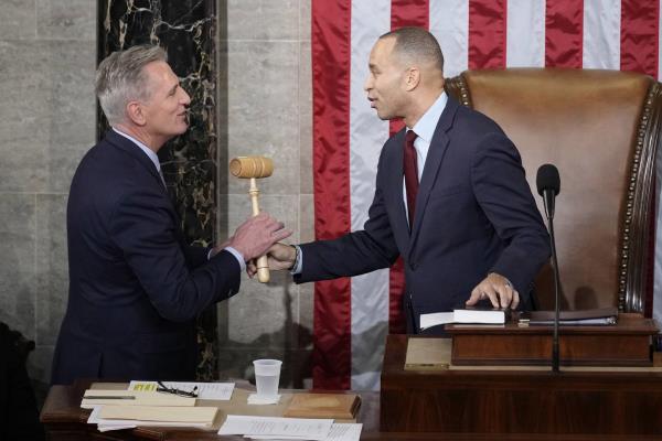Incoming House Speaker Kevin McCarthy of Calif., receives the gavel from House Minority Leader Hakeem Jeffries of N.Y., on the House floor at the U.S. Capitol in Washington, early Saturday, Jan. 7, 2023.