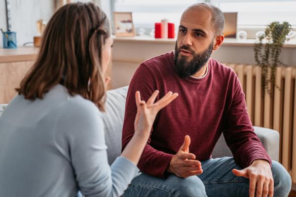 Young couple with relatio<em></em>nship problems arguing at home.