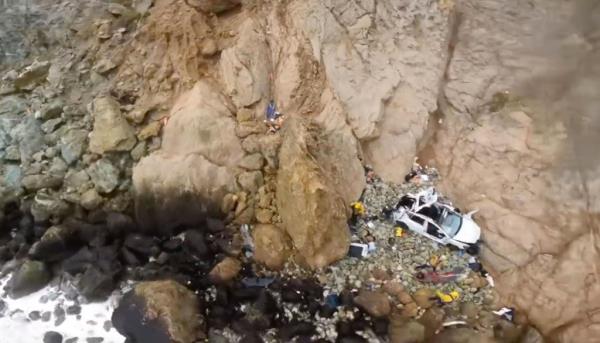 Wreck of Tesla after plunge off cliff