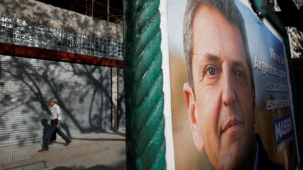 A campaign poster of Argentine presidential candidate Sergio Massa is pictured ahead of the November 19 runoff election, in Buenos Aires, Argentina November 15, 2023. REUTERS/Agustin Marcarian/File Photo