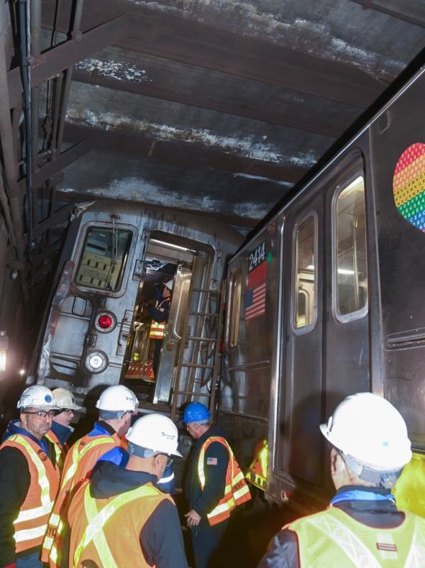 NYCT President Richard Davey, Chief Safety Officer Patrick Warren, SVP of Subways Demetrius Crichlow at the site of the collision and derailment north of 96 St