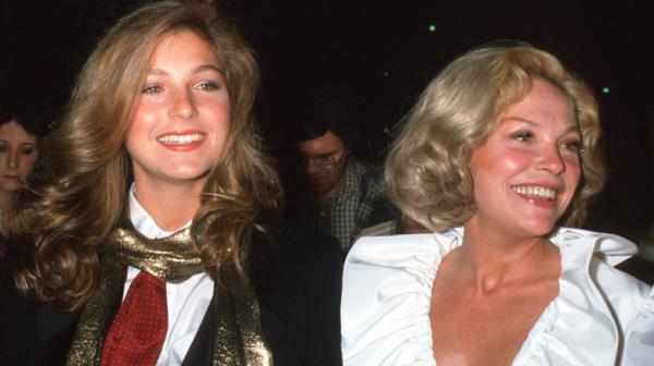 Tatum O'Neal and Joanna Moore smiling