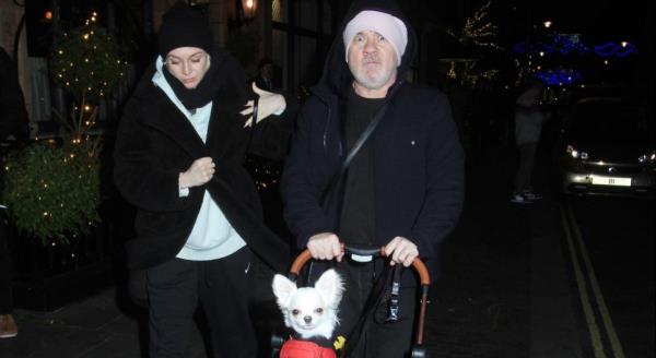 Sophie Cannell and Damien Hirst are practicing at pushing the pram with their new baby in. At the moment they o<em></em>nly put their dog and push it around but in a few mo<em></em>nths ti me they will be pushing their baby around.they went to scott?s and then they walked down the road with the pram. Everyone was looking at them especially when the little dog posed up but this is the best way to practice being a mum since Sophie has not been another before maybe Damien is showing her how to do it. They were very together and in love 18/12/2023 blitz pictures