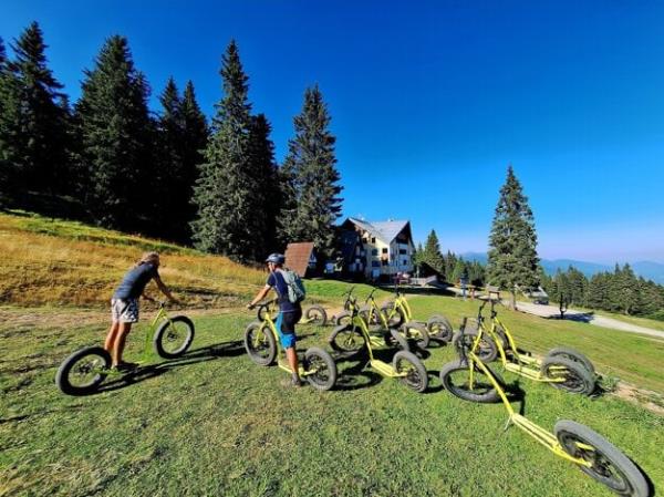 Climbers can take a scooter ride down the hill to wher<em></em>e their climb began.
