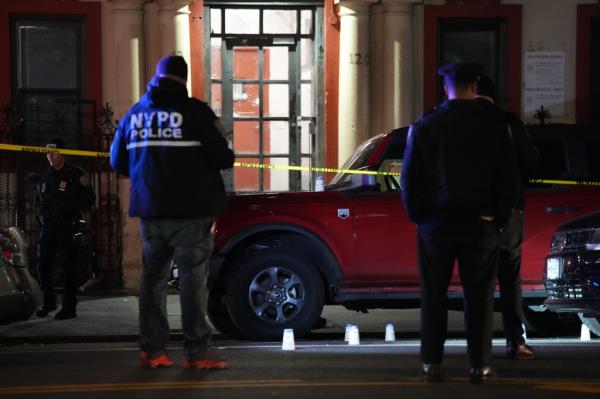 Scene of a triple-shooting at 120 Sherman Avenue