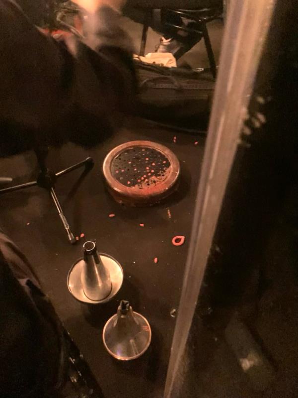 A 10-pound cylindrical, red-and-black part of a meat grinder prop Todd that landed in the orchestra pit, next to mutes