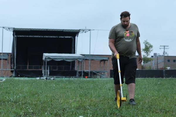 Tomlinson Fort marks out the grounds for the Miracle in Mundelein, a two-day music festival, outside of Rise on Sept. 6, 2023, in Mundelein.  
